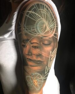 trippy atom string theory face portrait tattoo