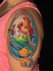 little mermaid sebastian cartoon color tatoo