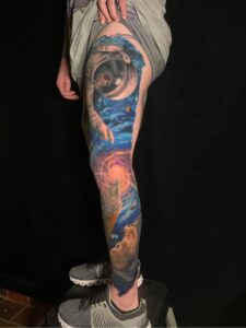 creation of adam monkey trippy space astronaut color tattoo