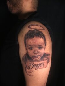 baby portrait memorial tattoo